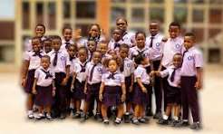 A group of pupils and staff at Royal Excellentia International School